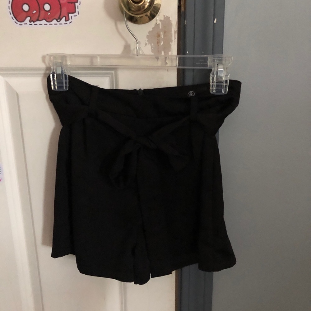 Black shorts with tie belt